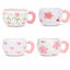 Mug en céramique blanc avec motif cerise et anse rose